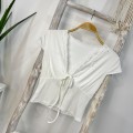 Pure and alluring white lace-trimmed cropped top